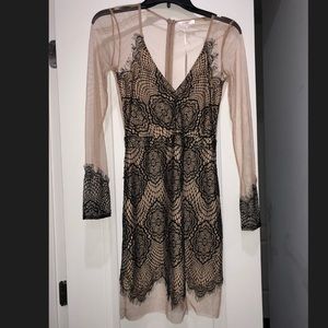 Black lace and nude dress